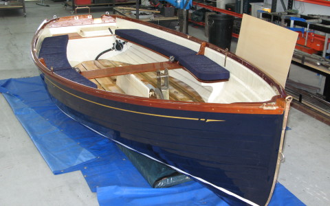 Super Yacht tender, Awlgrip paint with gold leaf cove line